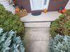 Cracked and Sinking Concrete Walkway Repaired in Wrightstown, Wisconsin - Photo 1