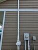 High Radon Test Results Lead Homeowners to Install Radon Mitigation System - Photo 1