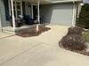 Severely Sunken Concrete Driveway and Sidewalk Lifted and Repaired in Fond Du Lac, WI - Photo 2