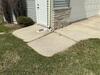 Severely Sunken Concrete Driveway and Sidewalk Lifted and Repaired in Fond Du Lac, WI - Photo 3