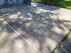 Concrete Driveway Leveled, Sealed and Repaired in Lowell, WI - Photo 4