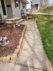 Cracked, Uneven Concrete Driveway Repaired in Kaukauna, WI - Photo 1