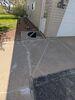 Concrete Driveway and Patio Lifted, Repaired and Joints Sealed in Clintonville, WI - Photo 1