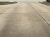 Concrete Driveway, Sidewalk, and Garage Floor Lifted and Repaired in Green Bay, WI - Photo 5