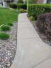 Concrete Driveway, Sidewalk, and Garage Floor Lifted and Repaired in Green Bay, WI - Photo 3