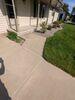 Concrete Driveway Lifted with PolyLevel Foam in Green Bay, WI - Photo 1