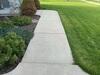 Sunken and Cracked Concrete Driveway Repaired by Contractor in Green Bay, WI - Photo 3