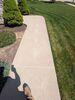 Sunken and Cracked Concrete Driveway Repaired by Contractor in Green Bay, WI - Photo 9