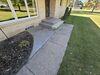 Severely Damaged Concrete Driveway and Walkway Lifted and Cracks Sealed in Schofield, Wisconsin - Photo 4