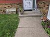 Concrete Walkway Lifted, Repaired & Sealed in Schofield, Wisconsin - Photo 3