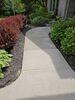 Sunken Concrete Driveway & Sidewalk Lifted, Sealed & Repaired in Sturgeon Bay, Wisconsin - Photo 2