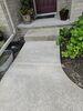 Sunken Concrete Driveway & Sidewalk Lifted, Sealed & Repaired in Sturgeon Bay, Wisconsin - Photo 1