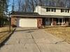 Cracked, Sunken and Deteriorated Concrete Driveway Repaired in Green Bay, Wisconsin - Photo 1