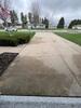 Cracked Concrete Driveway Lifted, Repaired & Sealed in Juneau, WI - Photo 1