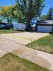 Cracked Concrete Driveway Lifted, Repaired & Sealed in Juneau, WI - Photo 3
