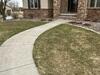Concrete Driveway Repaired & Stabilized in Appleton, WI - Photo 1