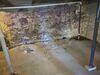 Wet Basement & Sagging Floors Repaired in Marshfield, WI - Photo 1