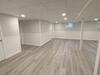 Basement Finishing Project Creates Beautiful Living Space in Nesconset, NY - Photo 1