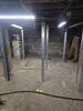 Installing New Support Posts in Dover Foxcroft, Maine Basement - Photo 1