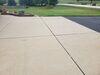 Sunken, Cracked Concrete Driveway Repaired, Leveled & Sealed in Suamico, WI - Photo 9