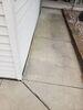 Sunken, Cracked Concrete Driveway Repaired, Leveled & Sealed in Suamico, WI - Photo 2