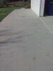 Sunken, Cracked Concrete Driveway Repaired, Leveled & Sealed in Suamico, WI - Photo 1