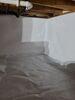 Damp Crawl Space Repaired with Vapor Barrier & Upgraded Sump Pump System in Shawano, WI - Photo 3
