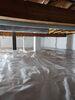 Damp Crawl Space Repaired with Vapor Barrier & Upgraded Sump Pump System in Shawano, WI - Photo 1