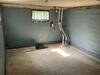 TripleSafe Battery Back-up Sump Pump Installation for Wet Basement in Menominee, MI - Photo 1