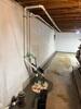 Tenant Laundry Room Waterproofing & Sump Pump Installation in Maquoketa, IA - Photo 1