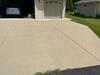 Uneven & Cracked Concrete Driveway Repaired & Sealed in Menasha, WI - Photo 1