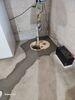 Wet Basement & Leaking Basement Floor Fixed with Sump Pump Upgrade in Sturgeon Bay, WI - Photo 1