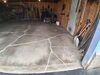 Cracked Concrete Garage Floor Leveled & Sealed in Tomahawk, WI - Photo 1