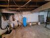 Damp Basement Issues Resolved with Install of Interior Drainage, Battery Back-up Sump Pump & Dehumidification System in Berlin, WI - Photo 4