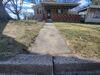 Uneven Concrete Sidewalk Leveled & Sealed to Prevent Further Issues in Berlin, WI - Photo 1