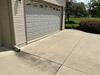 `Sunken Concrete Driveway and Walkway Lifted and Leveled in Berlin, WI - Photo 1