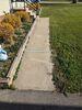 Cracked Concrete Sidewalk Leveling, Sealing & Repair in Little Suamico, WI - Photo 1
