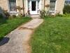 Concrete Walkway Leveled, Repaired & Joints Sealed in Oconto, WI - Photo 1