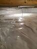 Damp Crawl Space Vapor Barrier Installation Fixes Moisture Issues for Entire Home in Minocqua, WI - Photo 3