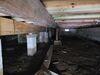Damp Musty Crawl Space Repaired Utilizing Vaper Barrier, Insulation Panels, Battery Back-up Sump Pump & Dehumidification System in Minocqua, WI - Photo 3