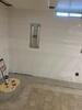 Basement Water & Moisture Issues Resolved with Interior Drainage, Sump Pump & Dehumidifier Installation in Manitowoc, WI - Photo 3