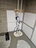 Wet Basement Repaired with Drainage System & Battery Back-up Sump Pump Installation in Sturgeon Bay, WI - Photo 1