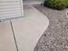 Concrete Driveway and Walkway Lifted, Repaired & Joints Sealed in New Franken, WI - Photo 1