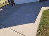 Settled, Uneven Concrete Driveway and Walkway Repaired in New Franken, WI - Photo 1