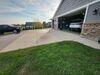 Uneven Concrete Driveway Repair & Joint Sealing in New Franken, WI - Photo 1