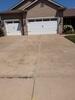 Bettendorf Concrete Leveling Sunken Driveway Slabs Lifted and Sealed - Photo 2