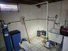 Wet Basement Repaired with Drainage System, Battery Back-up Sump Pump & Dehumidifier in Manitowoc, WI - Photo 2
