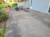 Sunken and Cracked Concrete Patio Repaired & Joints Sealed in New London, WI - Photo 1