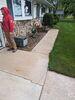Failing Concrete Driveway & Sidewalk Leveled, Repaired & Sealed in New London, WI - Photo 1