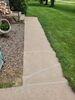 Failing Concrete Driveway & Sidewalk Leveled, Repaired & Sealed in New London, WI - Photo 3